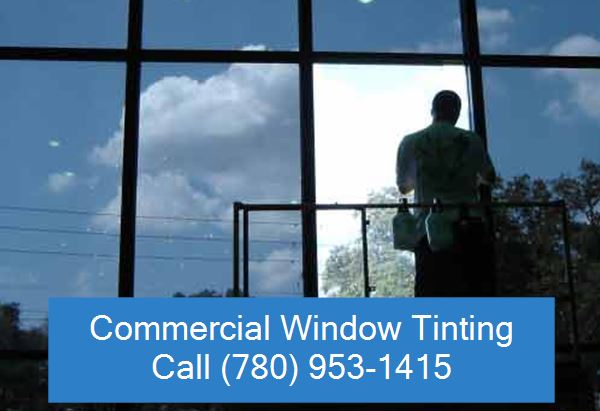 Guy Tinting a Window of a Highrise in Edmonton